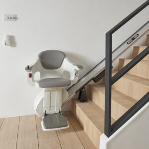 HomeGlide Stair Lift at the bottom of a staircase