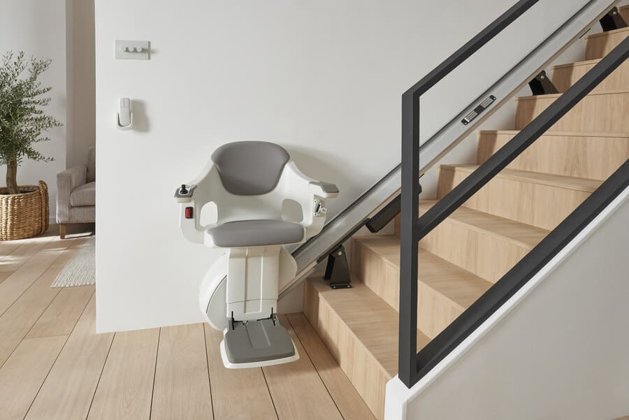 HomeGlide Stair Lift at the bottom of a staircase